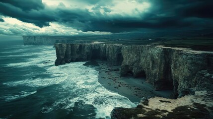 Weathering process idea. A dramatic coastal landscape featuring cliffs under a moody, stormy sky.