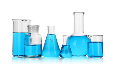 Laboratory glassware with blue liquid isolated on white