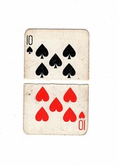 An old grubby playing card made up of torn halves of the same value.