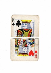 Obraz premium A king playing card made up of torn halves in different suits.