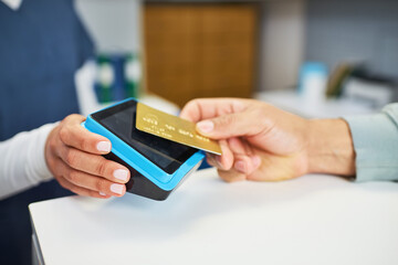 Contactless Payment Transaction Illustrating Financial Convenience in a Modern Healthcare Setting