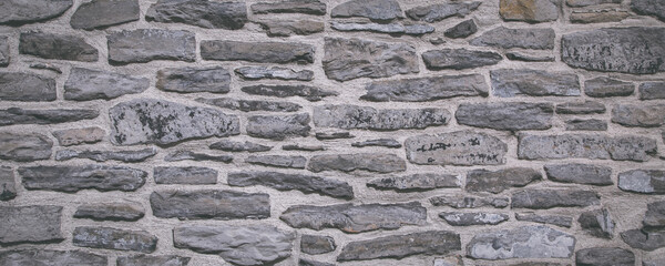 Gray color stone wall surface background banner