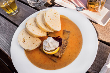 Sirloin sauce (svickova) with sliced beef, cream, lemon and dumpling