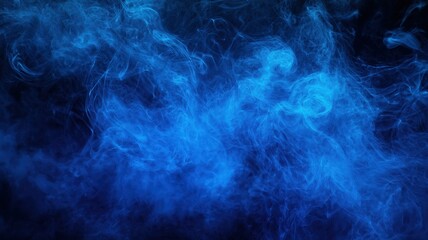 large teal cloud of smoke on a black background