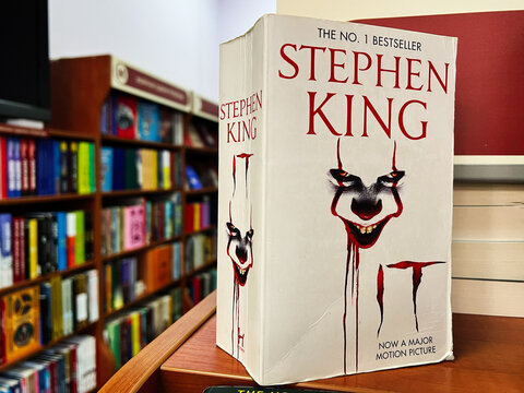 Stephen King's book 'It' displayed on a shelf in a bookstore