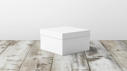 Minimalist white box on rustic wooden floor, isolated against a plain background.