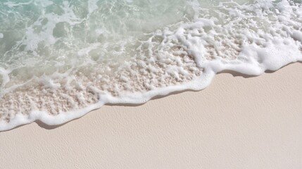 Soft Waves Caress the Sandy Shore at a Peaceful Beach During Daylight Hours