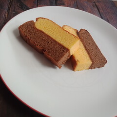 two layered cake on a white plate