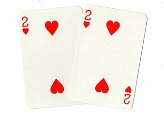 A hand of playing cards showing an identical pair on a white background.