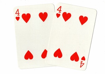A hand of playing cards showing an identical pair on a white background.
