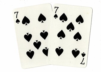 A hand of playing cards showing an identical pair on a white background.