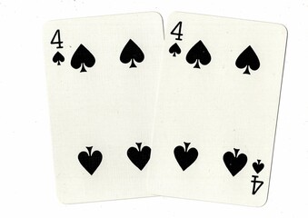 A hand of playing cards showing an identical pair on a white background.