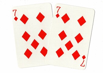 A hand of playing cards showing an identical pair on a white background.