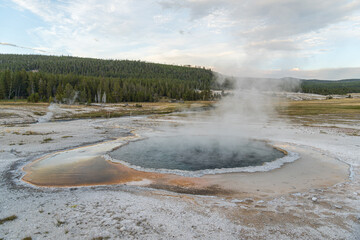 Crested Pool, hot spring in the Upper Geyser Basin of Yellowstone National Park at the dusk