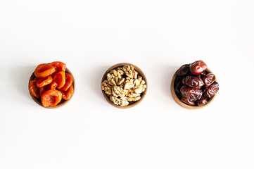 Organic Dates, Walnuts and Apricots a Perfect Trio for Healthy Snacking and Gourmet Recipes.