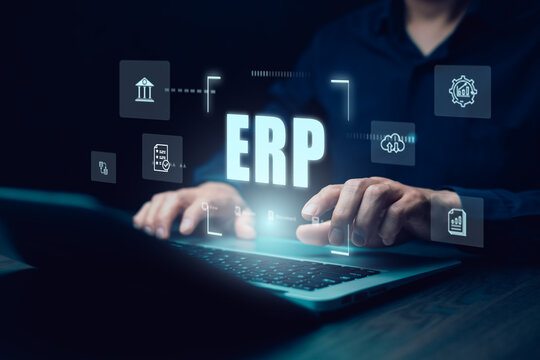 Business people using a laptop with document management for ERP. Enterprise resource planning concept,Enterprise Resource Management ERP software system for business resources plan presented.