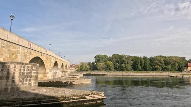 Old Stone Bridge (Steinerne Brucke) on the Danube River in Regensburg city, Bavaria, Germany