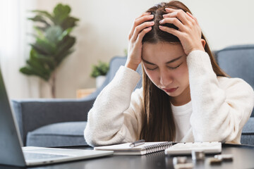 Stressed bankrupt financial crisis concept, Young adult in nervous after calculated loan expense...
