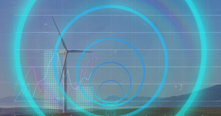 Image of financial data processing and scope scanning over wind turbines