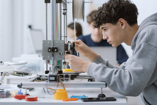 Student printing 3D prototypes in the lab