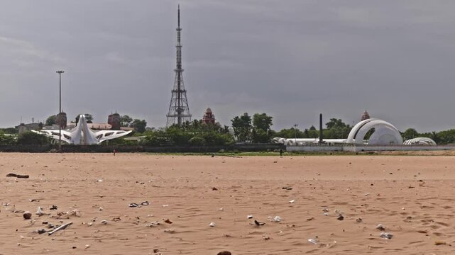 M. Karunanidhi Memorial, J. Jayalalithaa Memorial with signal tower and University of Madras view from marina beach, chennai, tamil nadu, india. day time, stable shot, 4k.