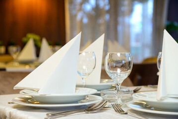February 23, 2025 - Belgrade, Serbia. Restaurant interior with set dining utensils.