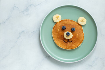 Funny kids breakfast, bear face pancakes