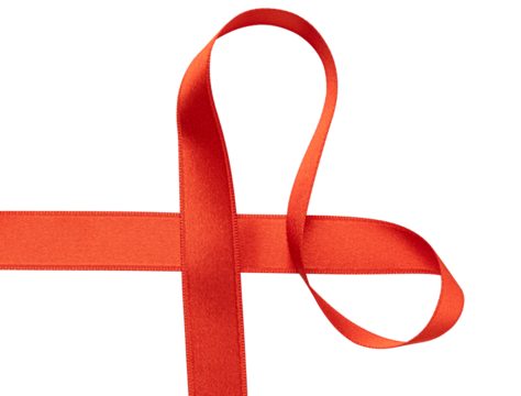 Red ribbon creating heart shape on white background