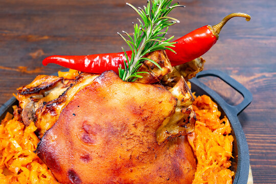 Delicious roast meat served with flavorful side dish and garnish