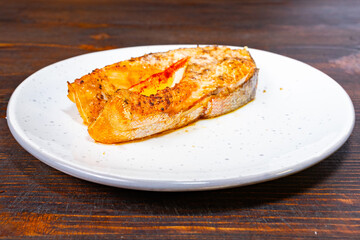 Delicious grilled salmon fillet served on a white plate