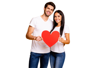 Photo of nice couple hugging holding in hands big paper heart trust each other wear casual clothes isolated yellow color background