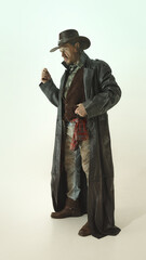 Portrait of brutal, serious man, cowboy with cigarette, gazing sideways with serious expression, wearing leather coat and hat against neutral background. American culture, history, wild west concept