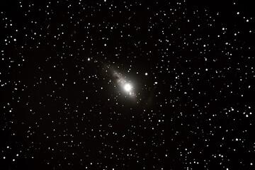 Obraz premium Wormhole gateway emerges within a vibrant star field filled with countless celestial bodies