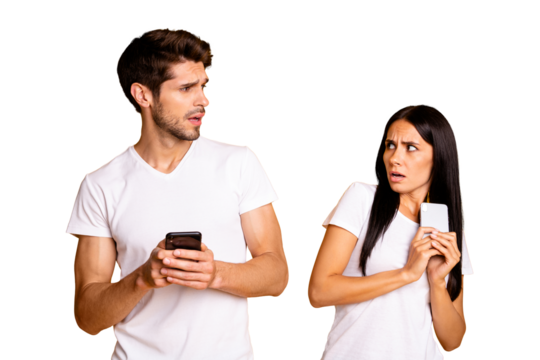 Photo of two people with telephones not trust each other private information wear casual clothes isolated yellow color background