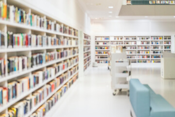 Library bookshelves stretching into distance with reading area. Concept of space and intellectual...
