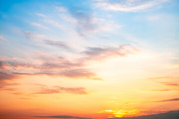 Sky,sunset, beautiful , luxury soft gradient orange gold clouds and sunlight on the blue sky perfect for the background, Sunrise on morning or everning in winter warm time ,Twilight summer,silhouette