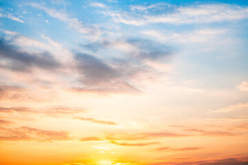 Sky,sunset, beautiful , luxury soft gradient orange gold clouds and sunlight on the blue sky perfect for the background, Sunrise on morning or everning in winter warm time ,Twilight summer,silhouette