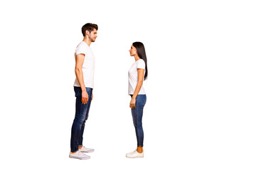 Obraz premium Full body profile photo of pair lady and guy looking eyes wait who begin conversation wear casual outfit isolated yellow color background