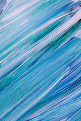 A close up photograph of hand made artwork. Brush strokes and texture of thick paint on paper