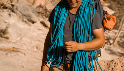 Man with a rope climbing in the mountains. Climbing in the mountains of Spain. Technical...