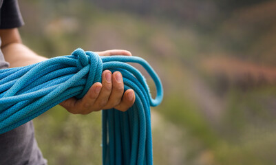 Man with a rope climbing in the mountains. Climbing in the mountains of Spain. Technical...