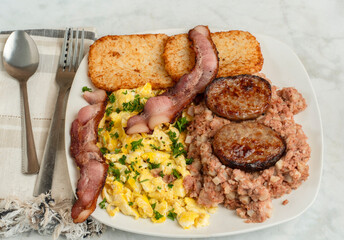 scramble eggs with corn beef hash and hash browns,