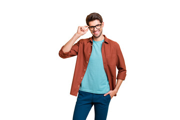 Portrait of his he nice attractive fashionable cheerful cheery brunet guy touching specs posing new cool modern look isolated over beige color pastel background