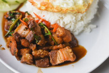 Crispy pork basil rice with fried egg