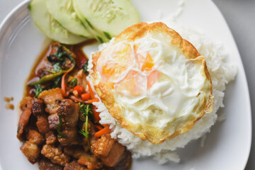 Crispy pork basil rice with fried egg