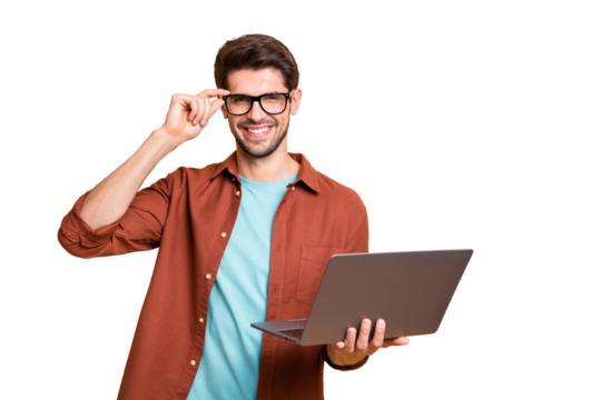 Portrait of his he nice attractive cheerful cheery successful content brunette guy holding in hands laptop working part-time touching specs isolated over beige color pastel background