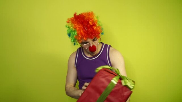 Young attractive student in a clown costume.