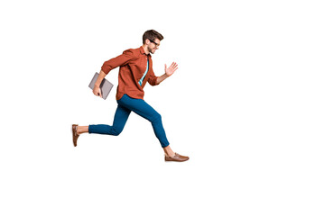 Full length body size view of his he nice attractive cheerful cheery successful brunet guy jumping in air carrying laptop running fast late hurry-up isolated over beige color pastel background