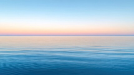 Obraz premium Calm ocean sunset seascape; pastel sky, tranquil water