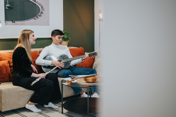 Friends enjoying music in a relaxed setting, playing a guitar and flute in their living room. © qunica.com